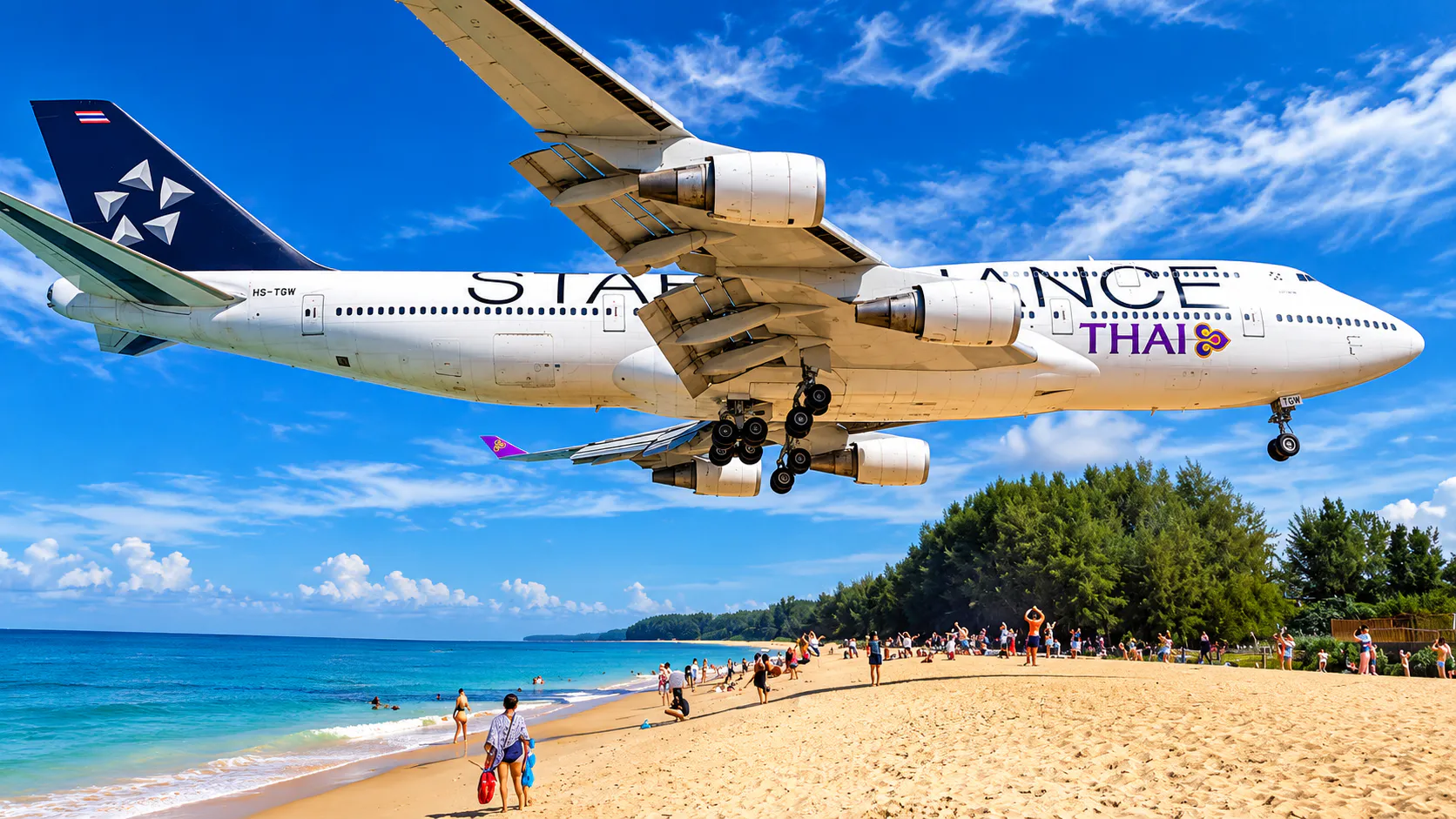 Mai Khao Beach Phuket with planes landing near the shore