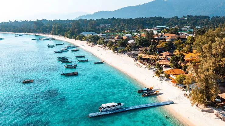 Tropical Thai beach with long-tail boats