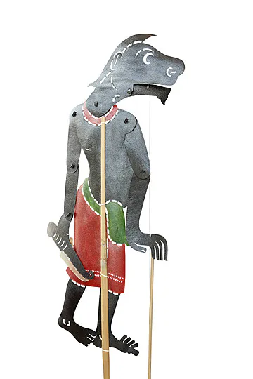 Traditional Nang Talung leather shadow puppet character with kris dagger